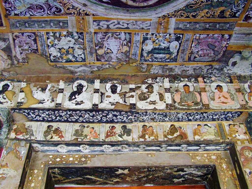 Ajanta caves: Frescoes in Cave 17, Ajanta Caves, Maharashtra, India. Photograph by Woudloper via Wikimedia Commons (CC-BY-SA-4.0)

