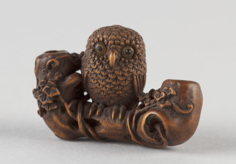 Anthropeum: Netsuke of owl on a branch, Japan, 19th century, Metropolitan Museum of Art, New York City, NY, USA.
