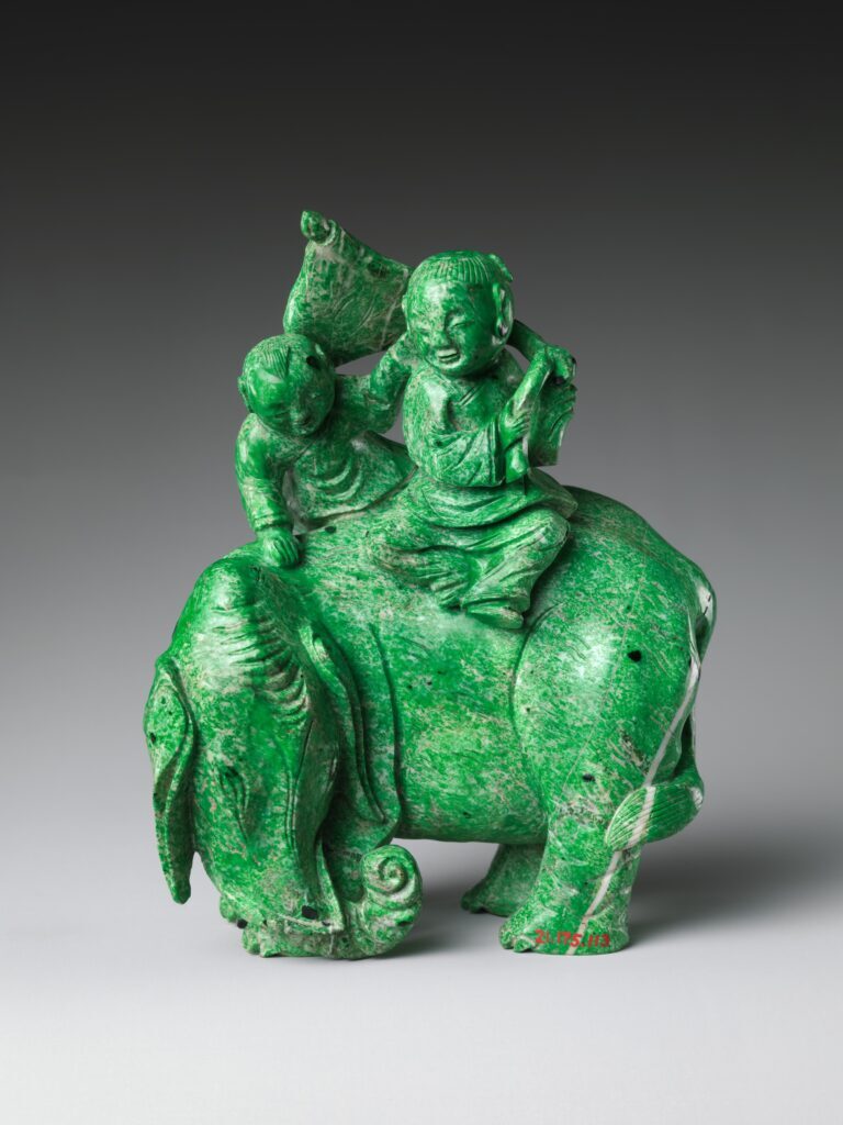 Jade art: Jade art: Jadeite figurine of an elephant and two boys, Qing Dynasty, China, 19th century, Metropolitan Museum of Art, New York City, NY, USA.
