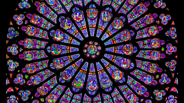 gothic stained glass: Gothic rose window, Notre-Dame de Paris, Paris, France. Photograph by Zachi Evenor via Wikimedia Commons (CC BY-SA 2.0). Detail.
