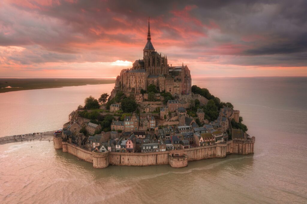 Places from Iconic Paintings: Mont-Saint-Michel, France. Photograph by Customerly via Unsplash.
